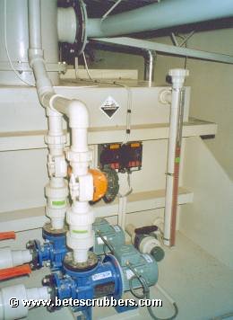 Packed tower scrubber for several acid gasses